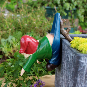 OwMell pants-stuck-branch gnome adds quirky focal point.