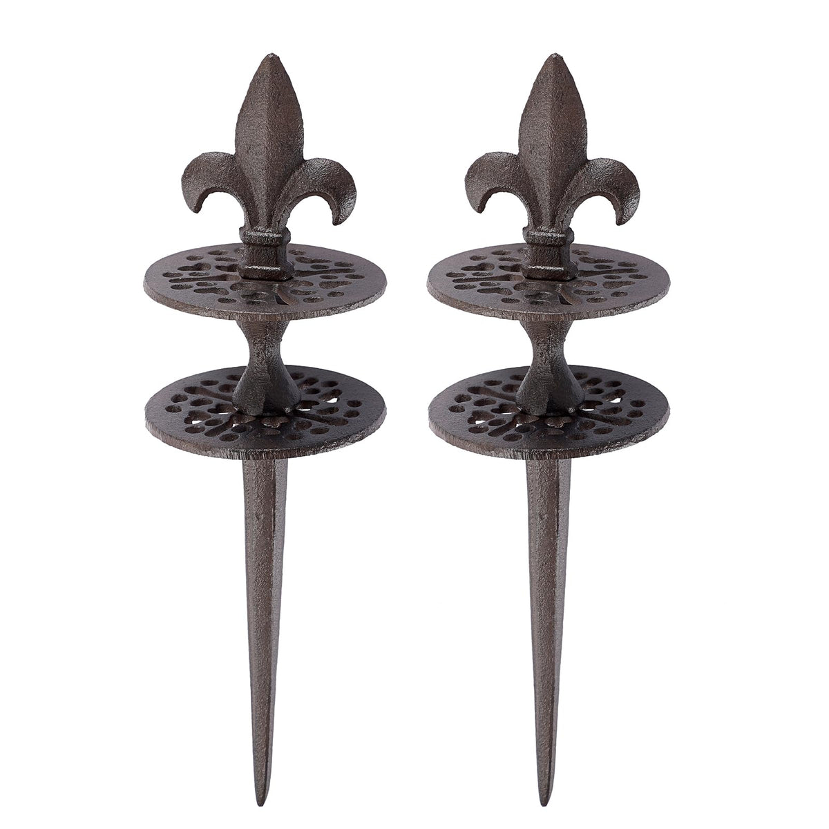 OwnMy cast iron hose guide stake with spear tip pattern protects flower beds during watering.