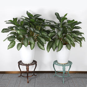 OwnMy outdoor indoor stand in garden setting with rust-resistant electroplated finish.
