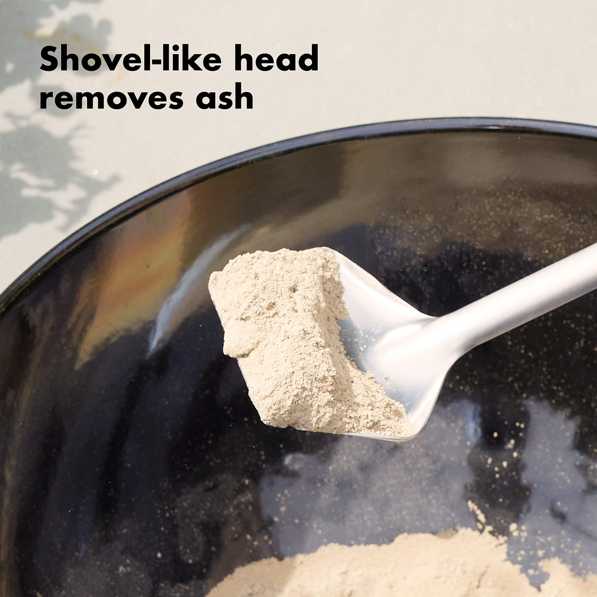 OXO coal rake long neck design keeps hands away from heat