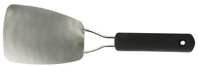 OXO Good Grips stainless steel flexible turner flipping a fish filet with precision