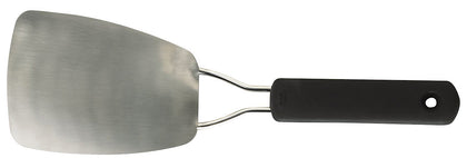OXO Good Grips stainless steel flexible turner flipping a fish filet with precision