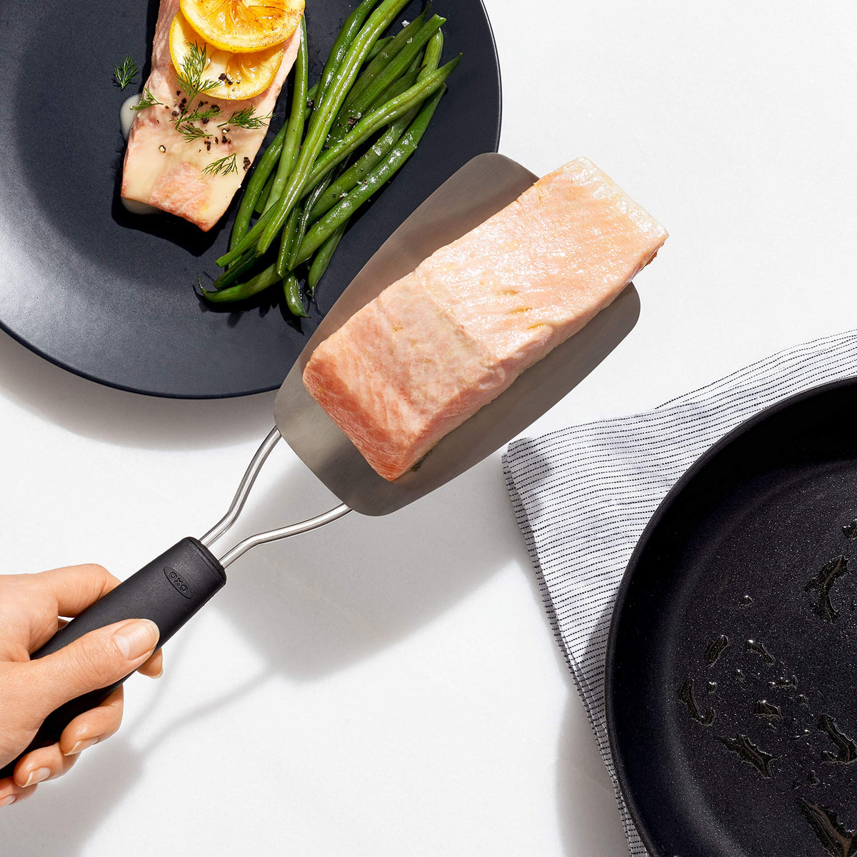 OXO Good Grips flexible turner lifting cookies without breaking them