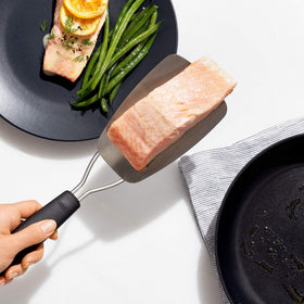 OXO Good Grips flexible turner lifting cookies without breaking them