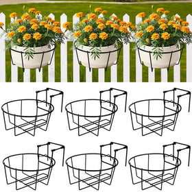 OYMVEKIK adjustable railing planter on a balcony rail for easy outdoor display.