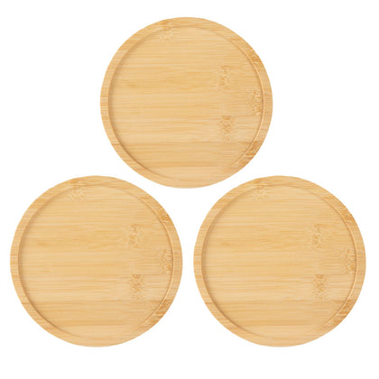 OYSIR bamboo saucer, 6-inch round, protecting surfaces under a plant pot.
