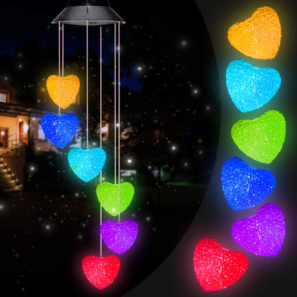 PACETAP Heart Solar Wind Chime garden display with warm ambient lighting.