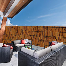 PAKNANO outdoor reed fence enhances garden privacy while preserving light.