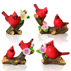 Pamonrueer cardinal figurines on a flowering branch, ideal garden accents