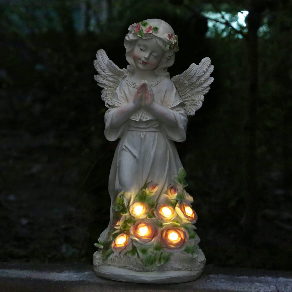 Panven front porch garden angel ornament enhances entryway appeal.