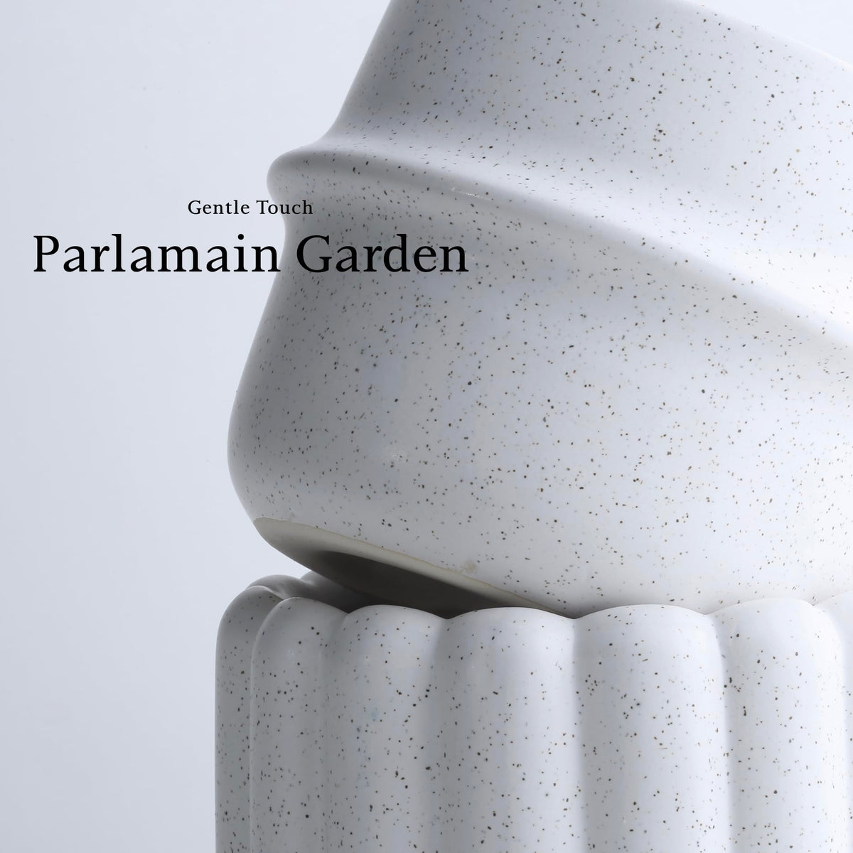 Parlamain terrazzo-style pots bring modern texture to living room shelves