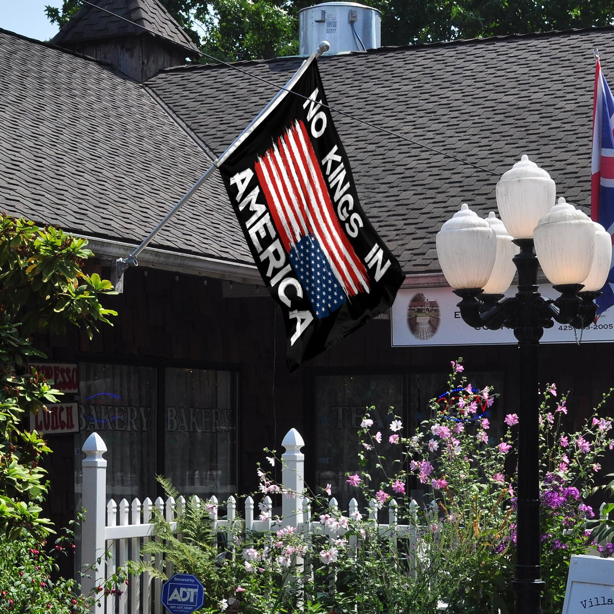 Parrekek No Kings In America flag with brass washers for easy mounting