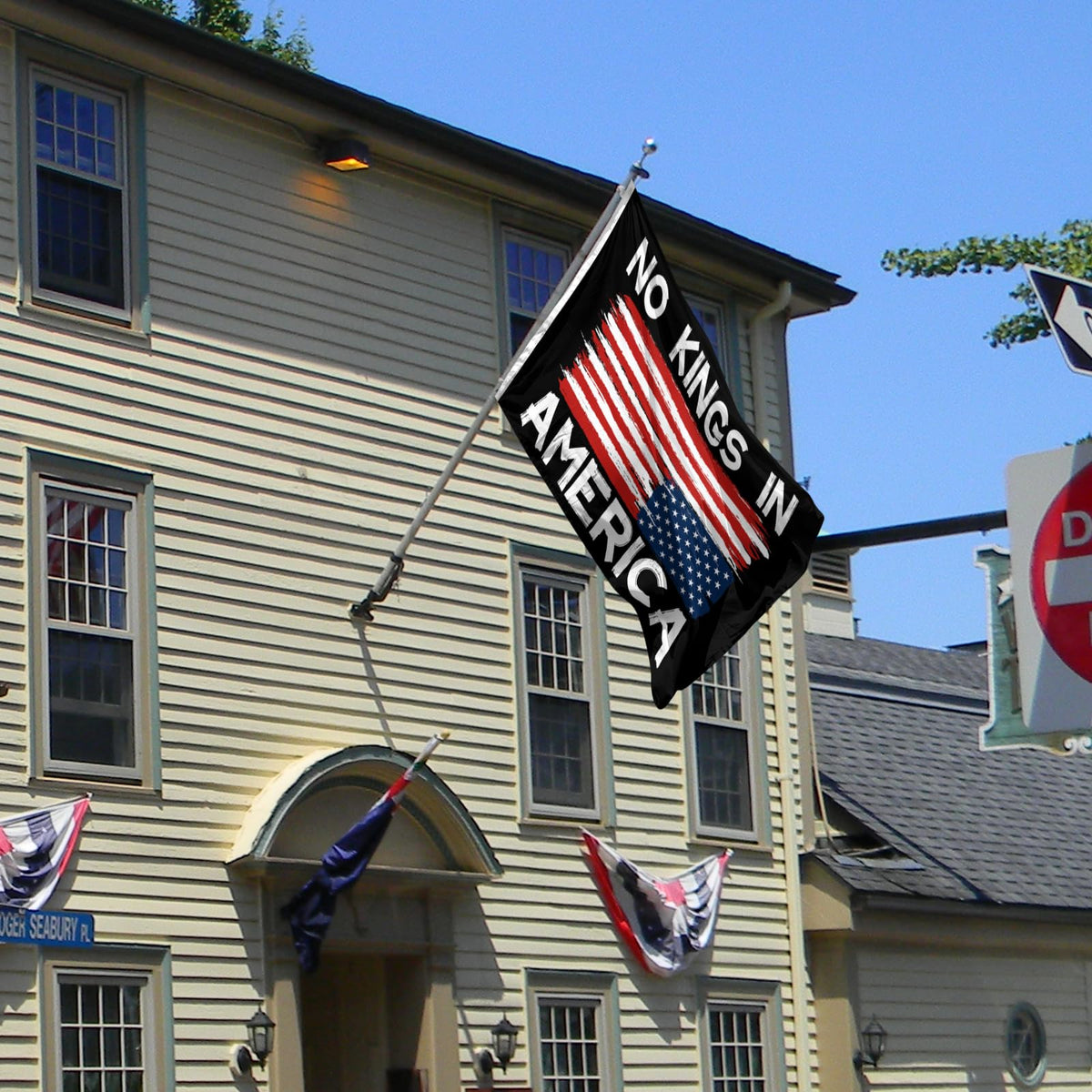 Parrekek flag fluttering on lawn with vibrant colors for patio display