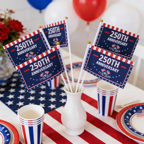 Party Greeting wooden sticks with gold finials add a polished patriotic touch.