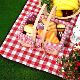 Patelai basket with lid open, ready to pack meals