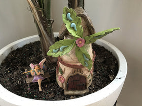 Patio Eden fairy on bench enhances indoor and outdoor fairy scenes