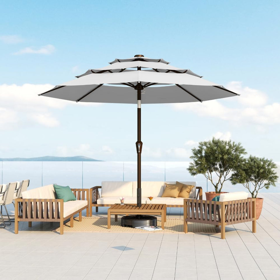 Patio Kingdom 10ft umbrella with 3-tier canopy providing ample shade for outdoor gatherings.