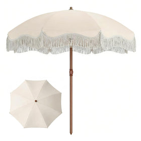 Patio Kingdom 7ft boho fringe umbrella provides portable shade for sunny days.
