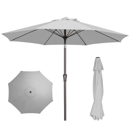 PatioKingdom 9ft umbrella open over a dining setup, providing comfortable shade.