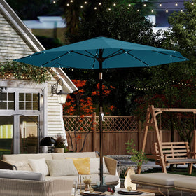 Patio Kingdom tilt-crank umbrella enables shading from moving sun angles.