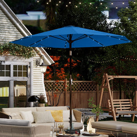 Patio Kingdom umbrella with crank and tilt for easy sun blocking during the day.