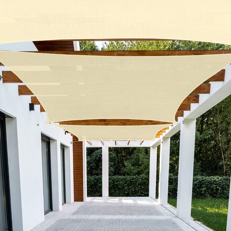 Patio Paradise sun shade sail rectangle provides broad shade for patios.