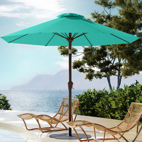 PatioKingdom Auto-Tilt 9FT umbrella in Peacock Blue provides adjustable shade.