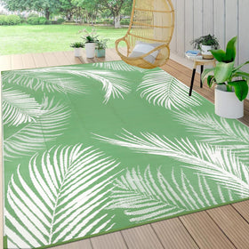 Pauwer leaf-green outdoor rug on patio showing color and durability