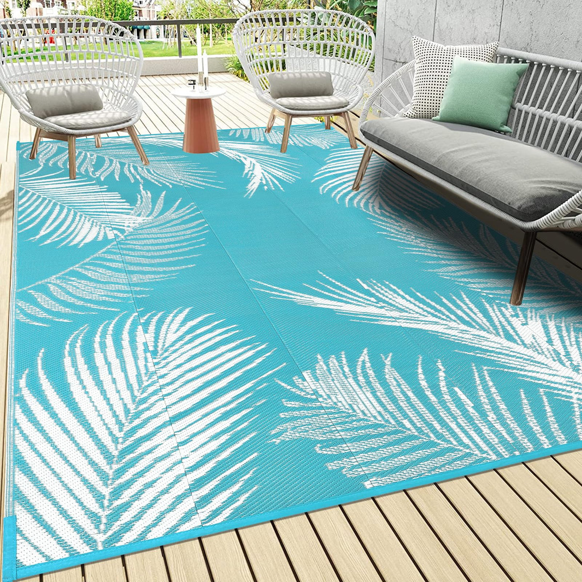 Pauwer leaf teal 6x9 reversible rug ideal for patios and balconies year-round.