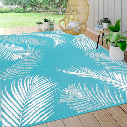 Pauwer leaf teal outdoor rug 8x10 for patio decor and weather-resistant durability.
