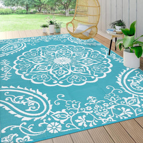 Pauwer outdoor rug showing reversible floral pattern for quick patio refresh.
