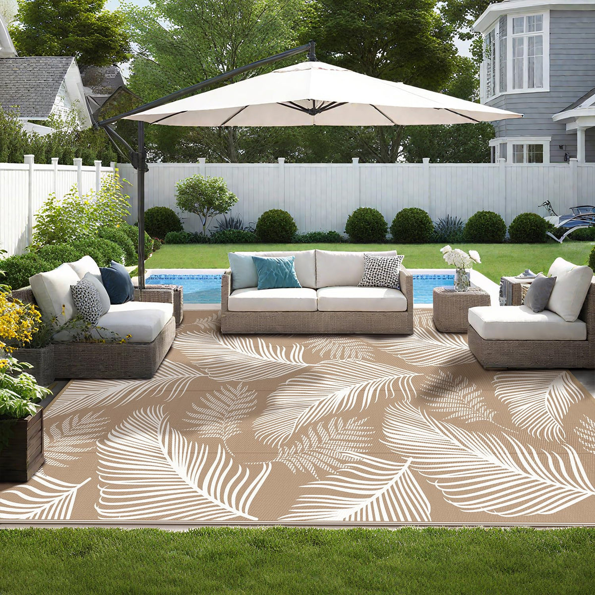 Pauwer plastic straw rug cleans easily with hose after outdoor meals.