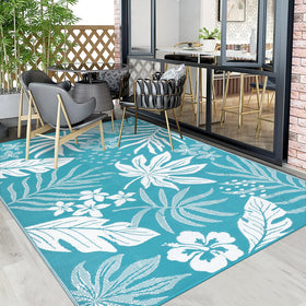 Pauwer rug with stakes shows secure placement on porch or deck