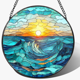 Pauyadu 8-inch beach stained glass suncatcher catches sunlight to reveal rainbow colors.