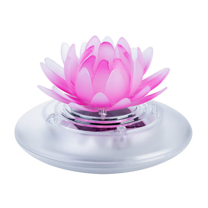 Pearlstar lotus floating light in pool creating ambient glow for evenings