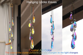 PEDOBO colored teardrop crystals showing changing light in natural sunlight.