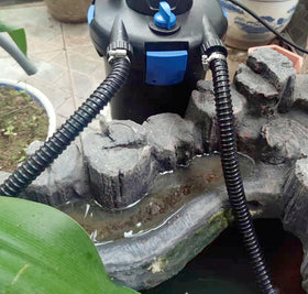 PEISONGFEI pond tubing shown with fountain and filtration setup.