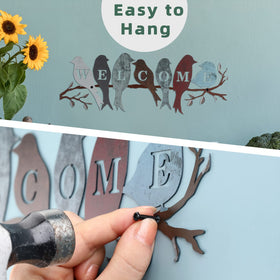 Outdoor wall decor featuring colorful birds and branch silhouette by Peryiter