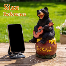 PETAFLOP weatherproof bear statue withstands rain and sun for year-round outdoor decor.