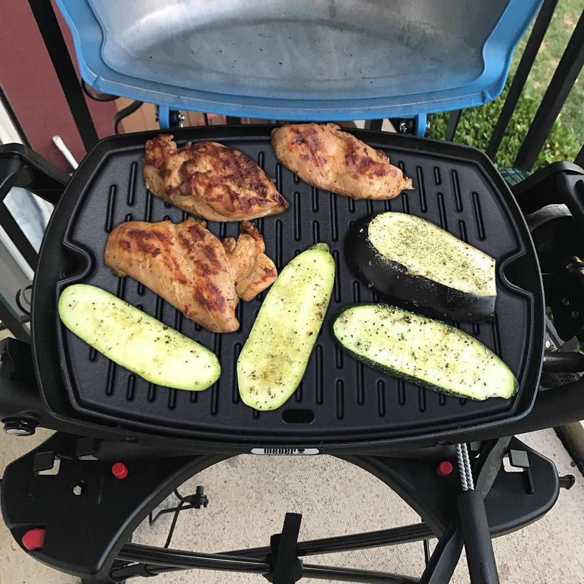 PETKAO Weber Q griddle 7582 searing side used for steaks and burgers.