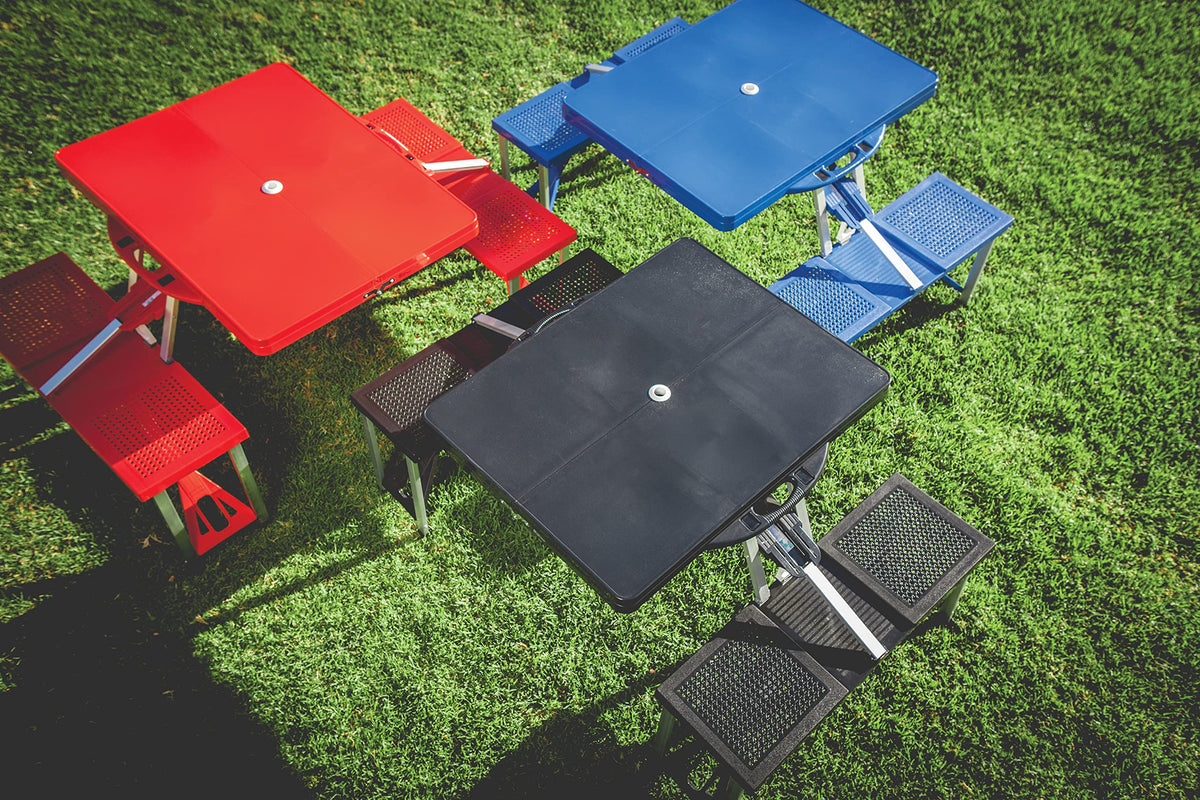 PICNIC TIME Oniva table collapses into a compact suitcase-style case for easy transport.