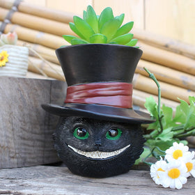 Picvelno cat-face desktop planter adds whimsy to your workspace.