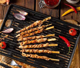 Pinchitto's skewers offer a natural look perfect for rustic grilled presentations.