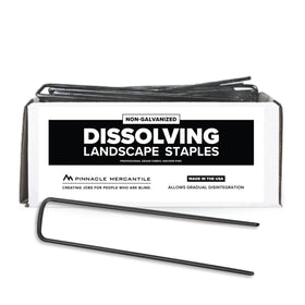 Pinnacle Mercantile USA-made dissolving staples securing landscape fabric in garden beds.