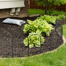 PINPON garden edge panel tucked into the landscape beside flowers