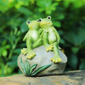 Pipilily green frog figure outdoors enhances yard decor with playfulness.