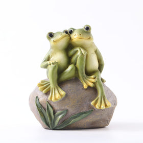 Pipilily resin frog garden statue perched on rock adds whimsical charm.