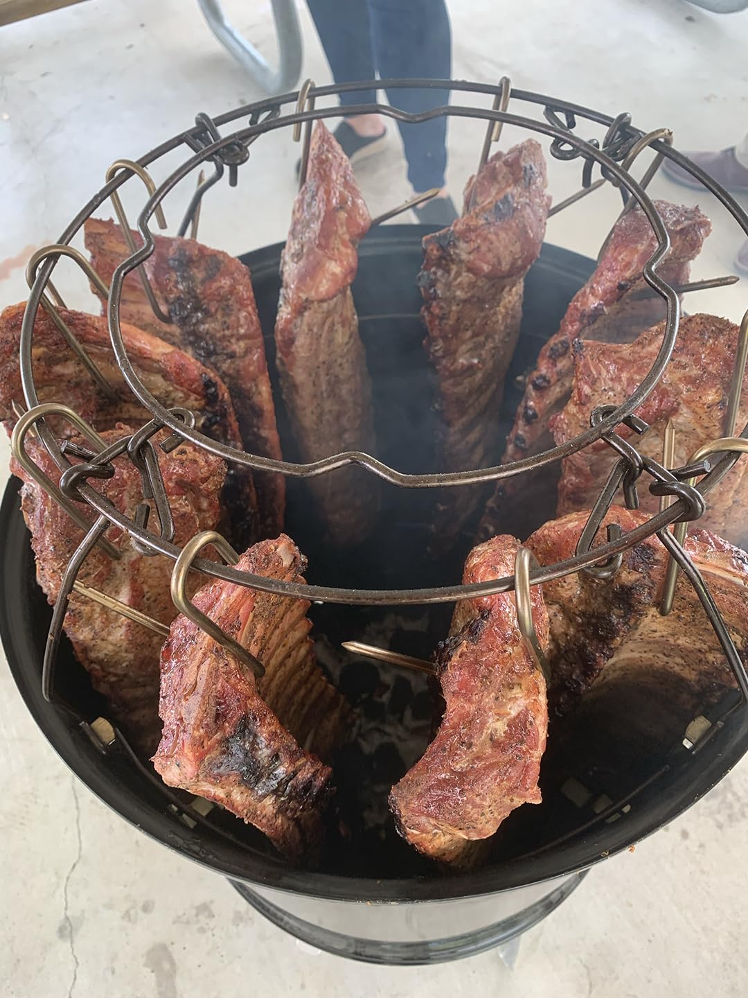 Pit Barrel hook remover helps you handle meat safely.