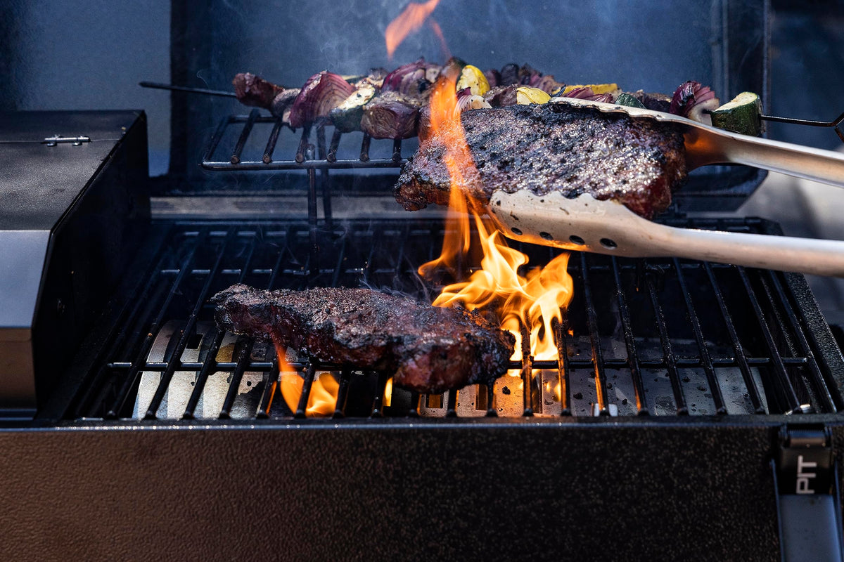 Pit Boss PB150PPB Flame Broiler enables direct searing up to 1000°F.