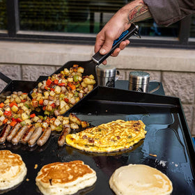 Pit Boss Ultimate Griddle Grub Shovel built-in bottle opener for convenient access.